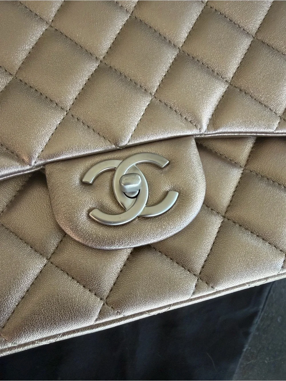 CHANEL Maxi Double Flap Bag in Metallic Gold Lambskin Leather